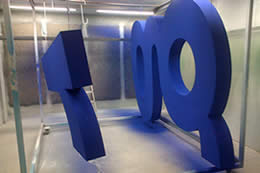 Powder coating and spraying the Bupa sign